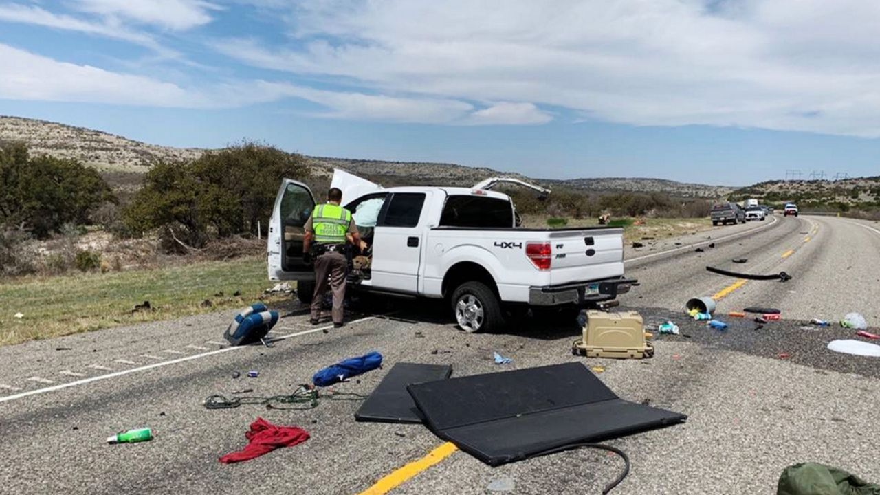 FILE: Debris is strewn across a road near the border city of Del Rio, Texas after a collision Monday, March 15, 2021. (Texas Department of Public Safety via AP)