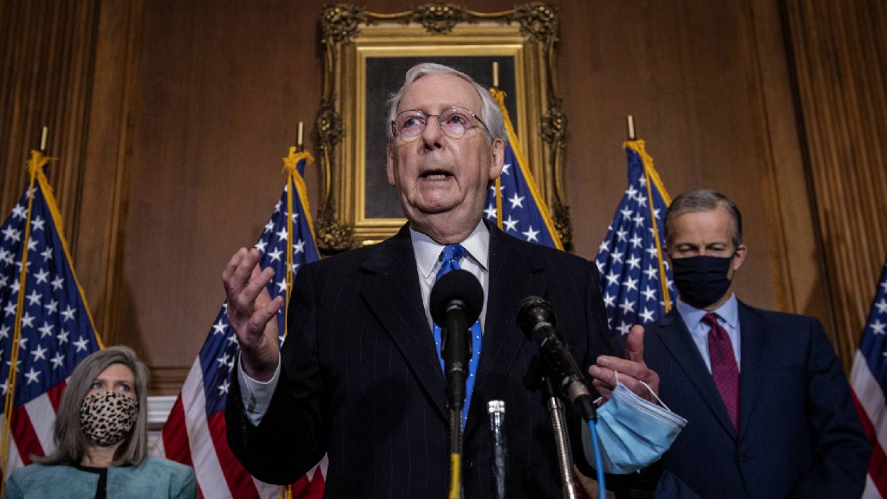 Senate Majority Leader Mitch McMcConnell speaks to reporters on Capitol Hill Tuesday. (Bill O'Leary/Pool via AP)