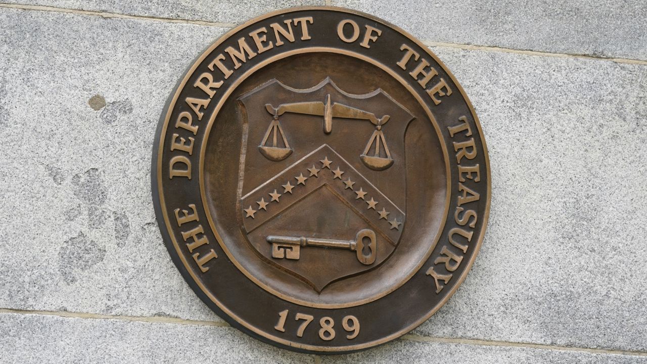 FILE: The Department of the Treasury's seal outside the Treasury Building in Washington. (AP Photo/Patrick Semansky)