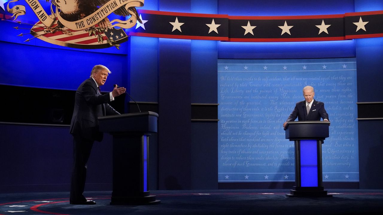 President Donald Trump and Democratic presidential candidate former Vice President Joe Biden during the first presidential debate Tuesday, Sept. 29, 2020, at Case Western University and Cleveland Clinic, in Cleveland, Ohio. (AP Photo/Julio Cortez)