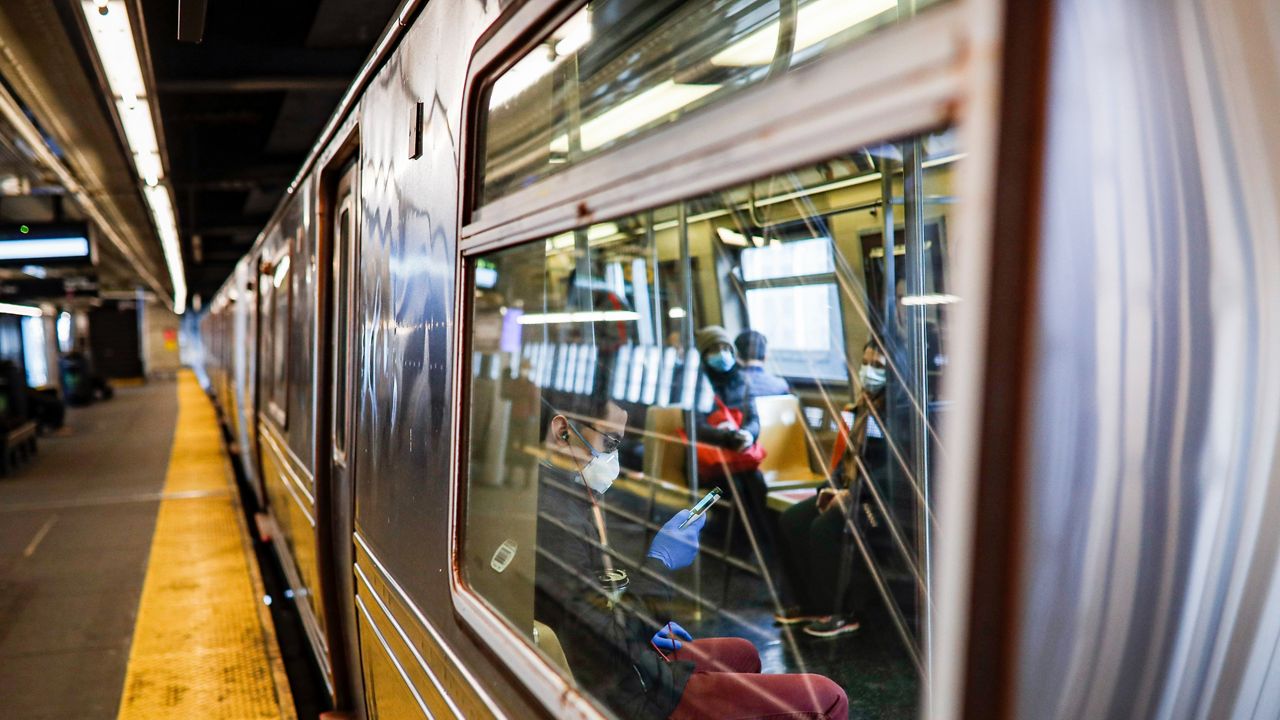 Riders use the subway on Tuesday, April 7, 2020 in New York.