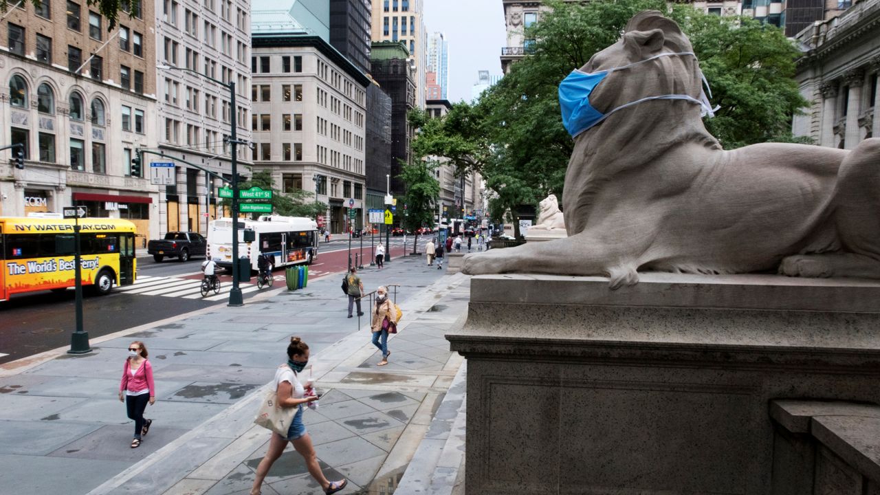 A stone lion at the New York Public Library Main Branch, July 1, 2020. (AP Photo/Ted Shaffrey)