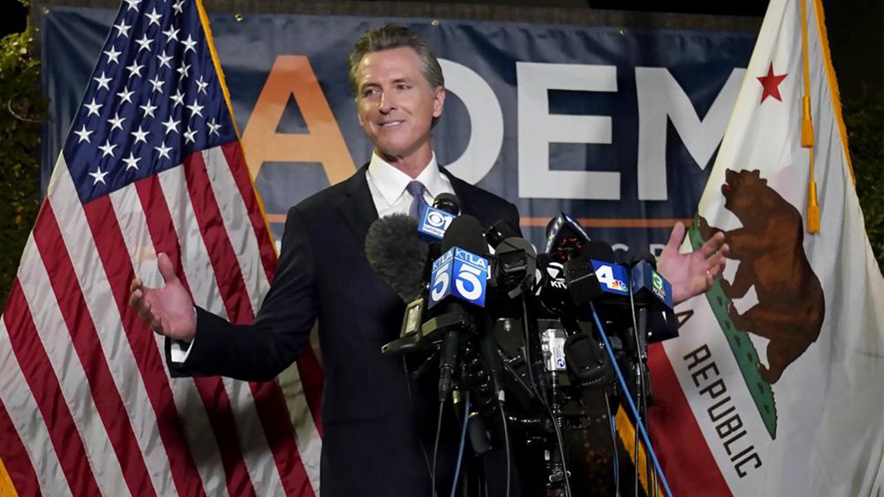 In this Sept. 14, 2021, file photo, California Gov. Gavin Newsom addresses reporters after beating back the recall attempt that aimed to remove him from office, in Sacramento, Calif.  (AP Photo/Rich Pedroncelli, File)