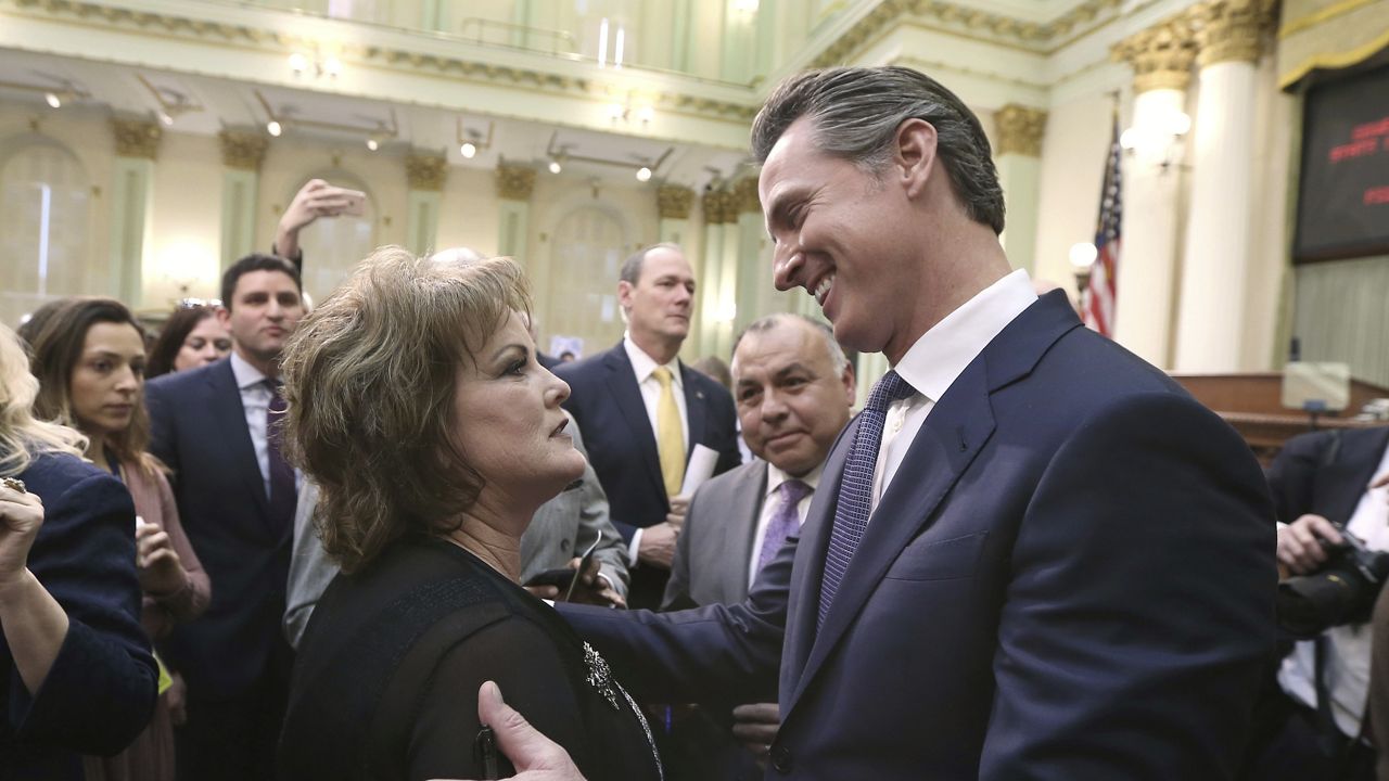 California Gov. Gavin Newsom talks with Senate Republican Leader Shannon Grove, of Bakersfield, Calif., after giving his first State of the State address to a joint session of the Legislature at the state Capitol in Sacramento, Calif., Tuesday, Feb. 12, 2019. (AP Photo/Rich Pedroncelli)