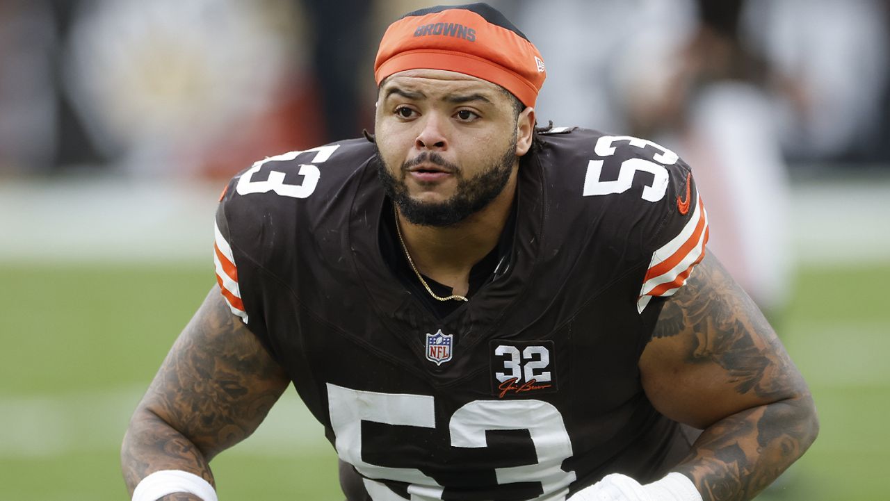 Cleveland Browns center Nick Harris (53) warms up during the second half of an NFL football game against the Jacksonville Jaguars, Sunday, Dec. 10, 2023, in Cleveland. (AP Photo/Ron Schwane)