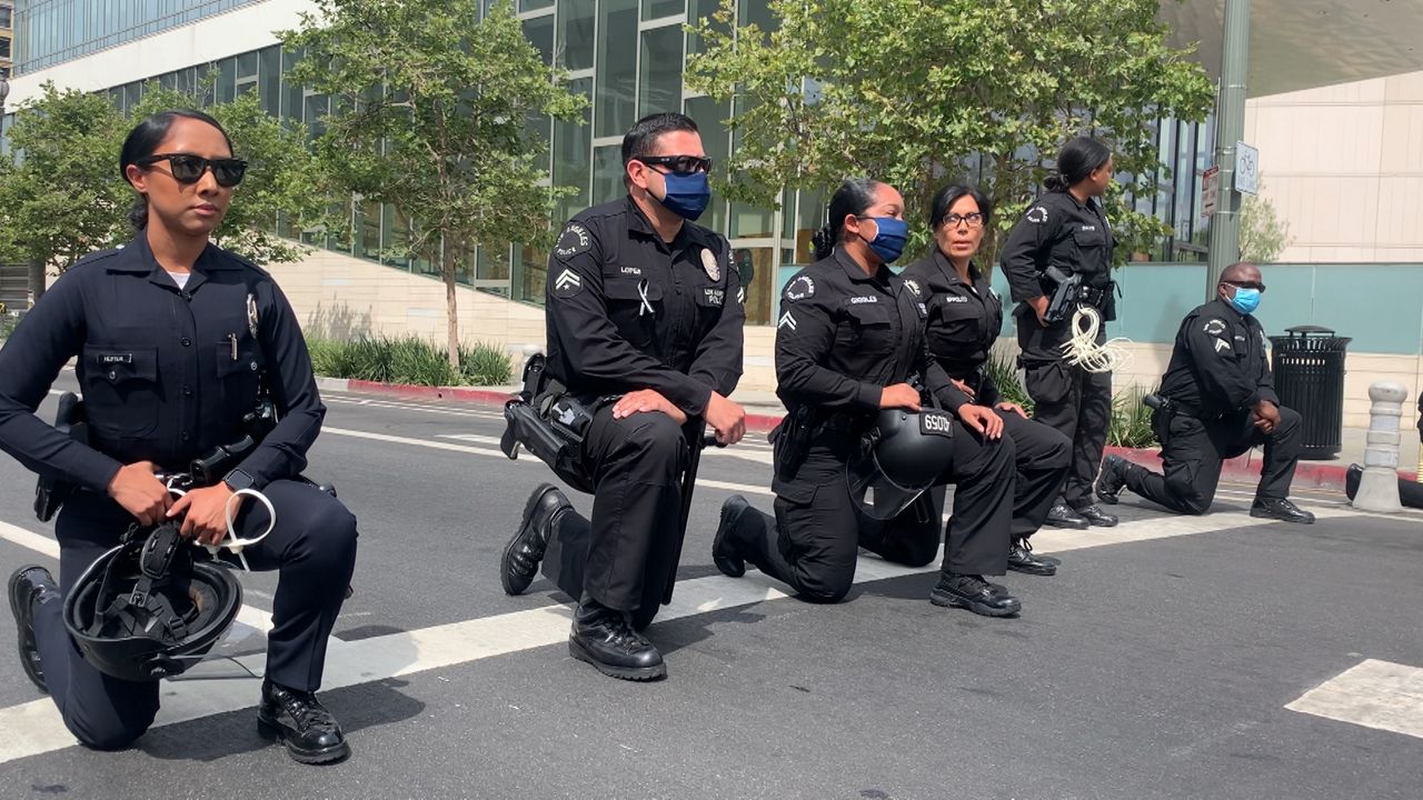 Lapd Takes A Knee As Baptist Ministers Bring Protest 2874