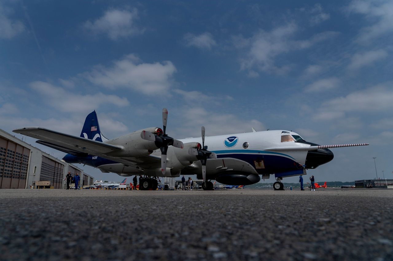National Oceanic and Atmospheric Administration's WP-3D Orion hurricane hunter aircraft stands on the tarmac at Washington National Airport, Arlington, Va., Tuesday, May 3, 2022.
