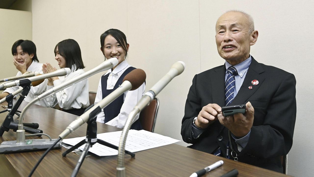 Toshiyuki Mimaki, right, president of Nihon Hidankyo, speaks to media members in Hiroshima, Japan, Friday, Oct. 11, 2024, as he reacts to Ninon Hidankyo's winning the Nobel Peace Prize. (Moe Sasaki/Kyodo News via AP)