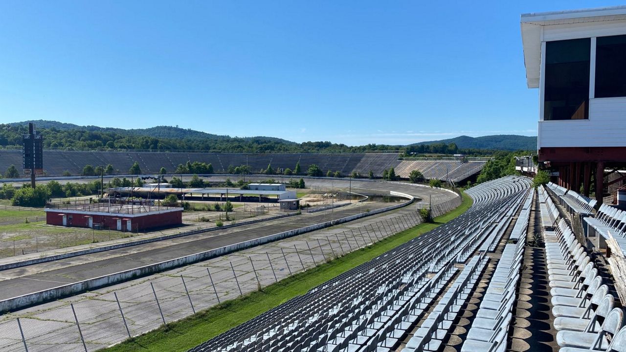 Workers say they found what could be a "moonshiner's cave" under the frontstretch grandstand at the historic North Wilkesboro Speedway. This photo shows the frontstretch in 2021, before work began to reopen the track. (Spectrum News 1/Charles Duncan)