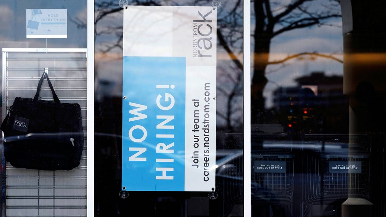 A hiring sign is seen at a retail store in Schaumburg, Ill., on April 1. (AP Photo/Nam Y. Huh, File)