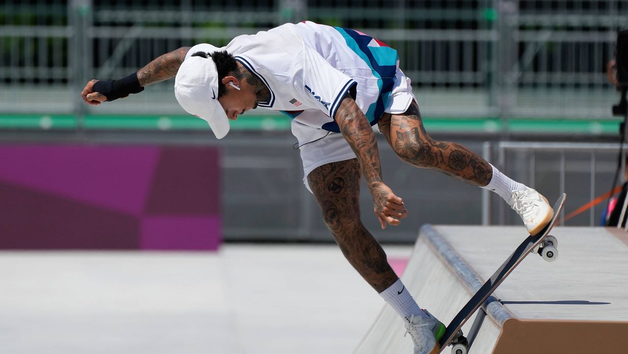 Nyjah Huston of the United States competes in men's street skateboarding at the 2020 Summer Olympics, July 25, 2021, in Tokyo, Japan. Huston is headed back to the 2024 Paris Summer Olympics with a determination to improve on his non-medal performance three years ago in Tokyo. (AP Photo/Ben Curtis, File)