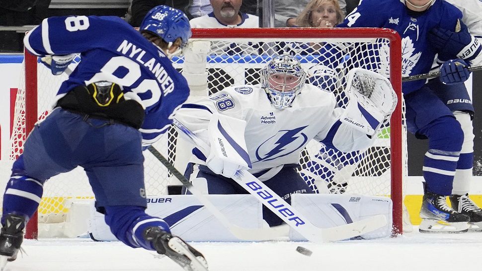 Toronto Maple Leafs right wing William Nylander (88) scores on Tampa Bay Lightning goalie Andrei Vasilevskiy (88) during the first period of an NHL hockey game in Toronto, Monday, Oct. 21, 2024. (Frank Gunn/The Canadian Press via AP)