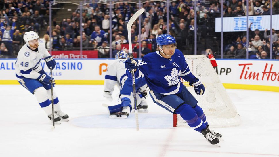 Toronto Maple Leafs' William Nylander (88) celebrates after a goal against the Tampa Bay Lightning in second-period NHL hockey game action in Toronto, Monday, Jan. 20, 2025. (Cole Burston/The Canadian Press via AP)