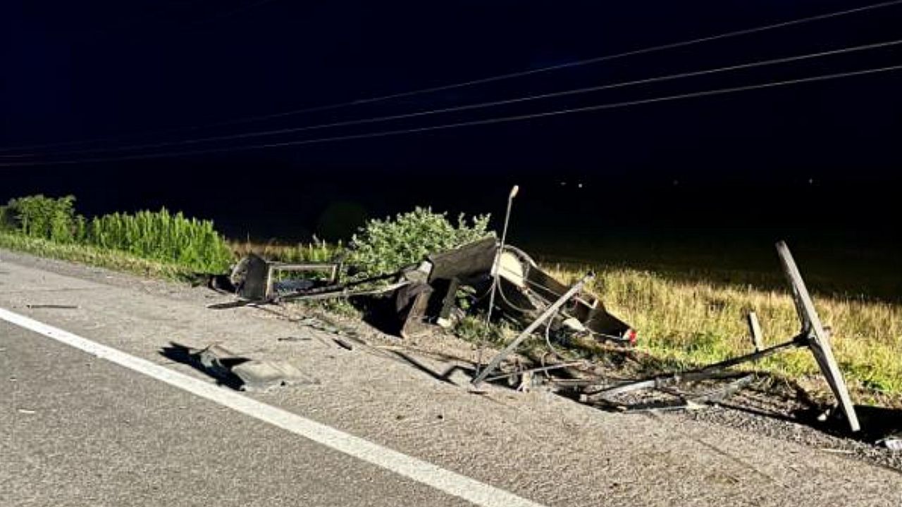 aftermath of a fatal Amish buggy crash along a road at night