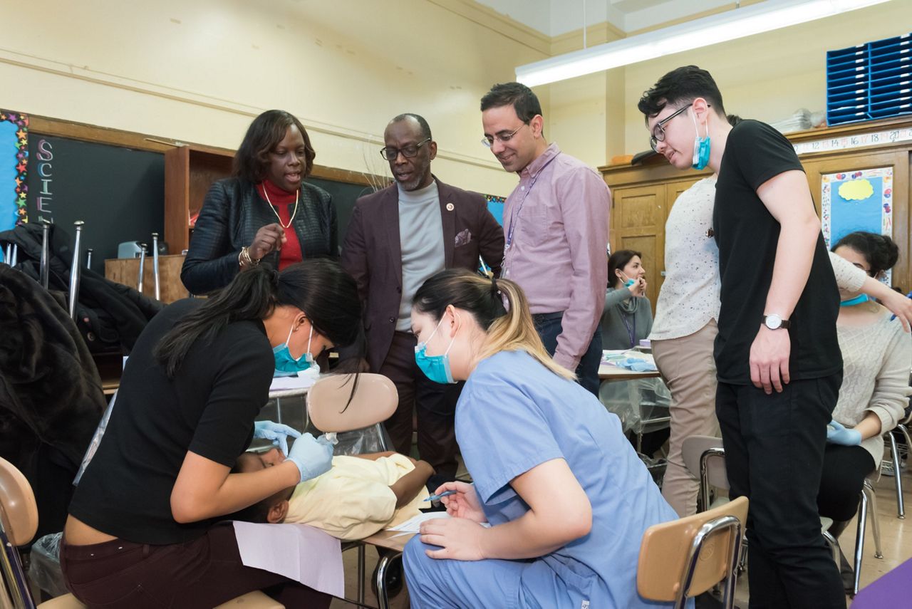 NYU's College of Dentistry expands mobile care program to Queens school