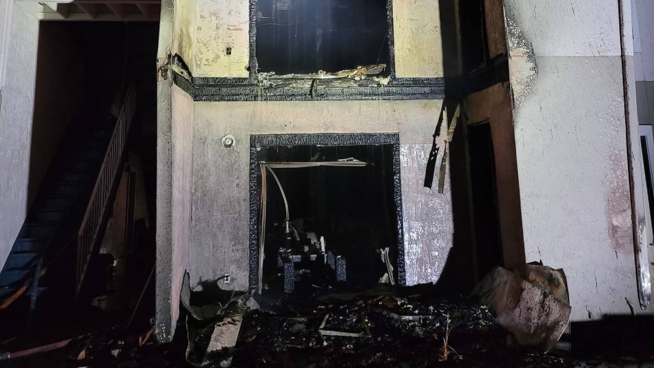 The fire broke out Saturday morning in which officials said they responded to calls of smoke and several people hanging on to balconies. (Orange County Fire Rescue)