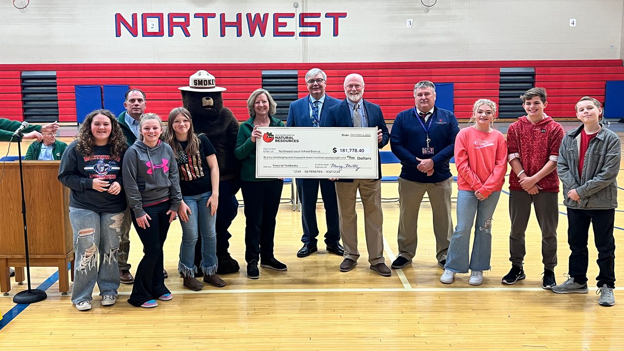 The Division of Forestry visited the Northwest Local School District to deliver the check to school administrators. (Photo courtesy of the Ohio Department of Natural Resources.