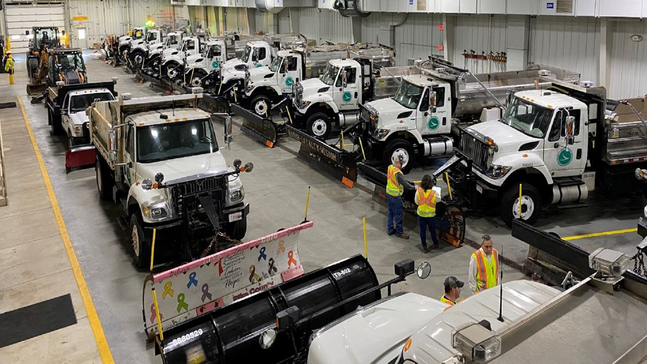 ODOT plows lined up in garage. (Ohio Department of Transportation)