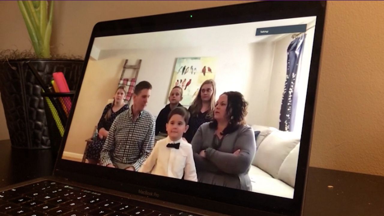family on a laptop screen