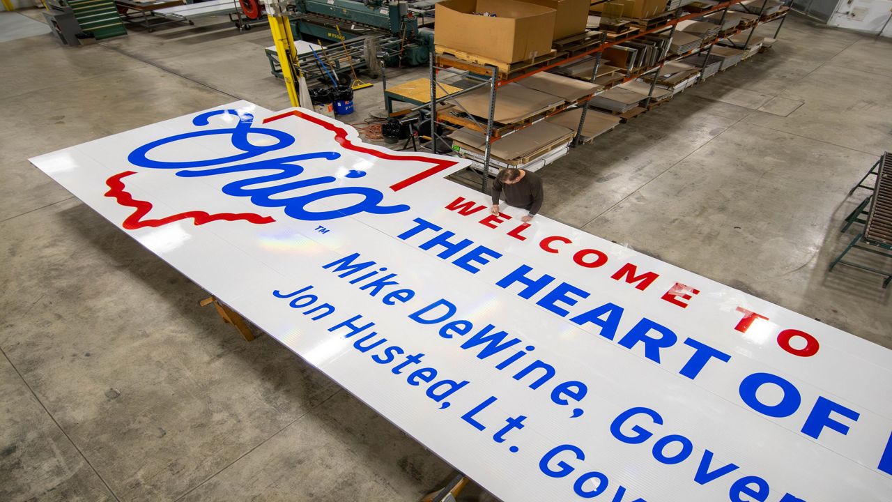 A new sign created for Ohio welcomes visitors to "The Heart of it All". (Photo Courtesy ODOT)