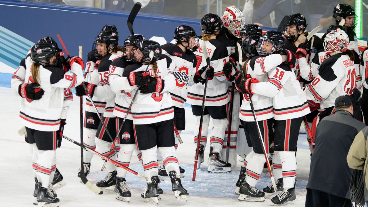 Ohio State celebrates a win over Yale after an NCAA college women's Frozen Four semifinal hockey game Friday, March 18, 2022, in State College, Pa.