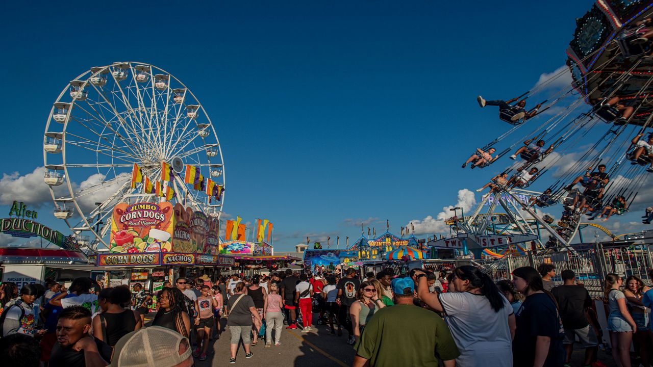 Evening shot of Main St. Drag with fairgoers. (Photo courtesy the Ohio State Fair)