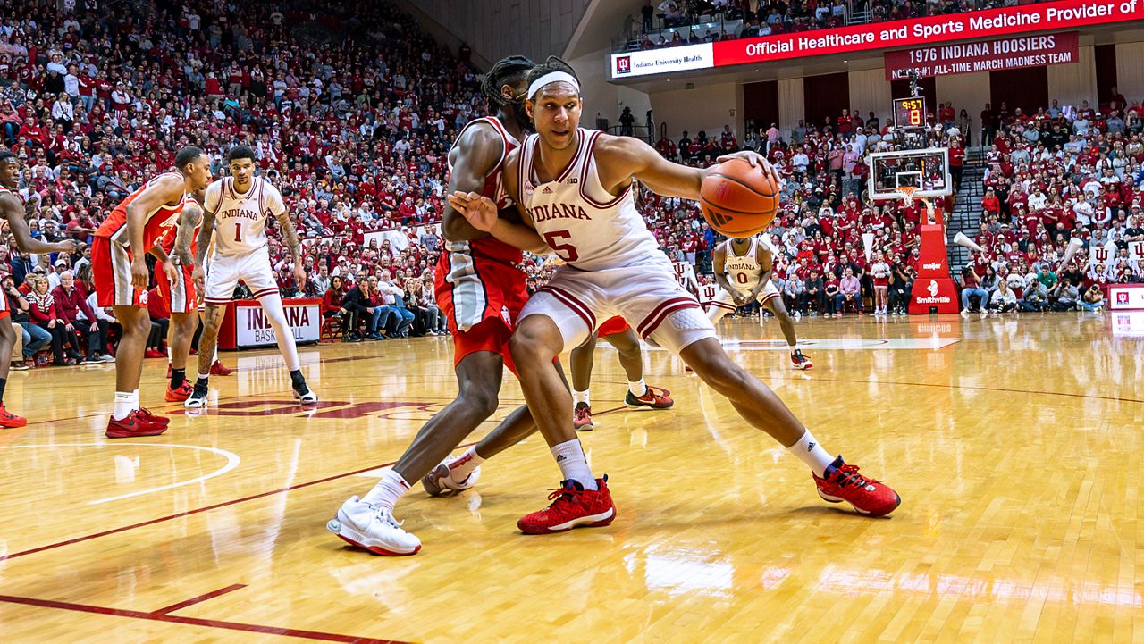 Indiana forward Malik Reneau (5) works the ball into the Ohio State defense 