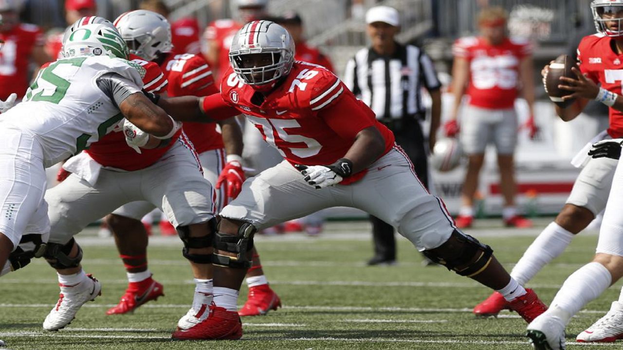 FILE - In this Sept. 11, 2021, file photo, Ohio State offensive lineman Thayer Munford (75) plays against Oregon during an NCAA college football game in Columbus, Ohio. Munford wanted to give himself his best chance to make it to the NFL. So a star who already had been invited to the Senior Bowl decided to return and become a “Super Senior.” (AP Photo/Jay LaPrete, File)