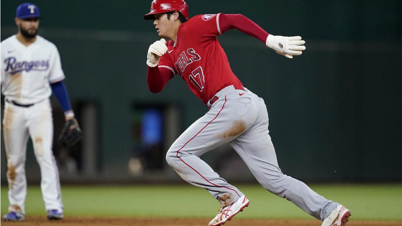 May 26, 2021: Los Angeles Angels third baseman Taylor Ward (3) hits a three  run homer in the first inning during the game between the Texas Rangers and  the Los Angeles Angels