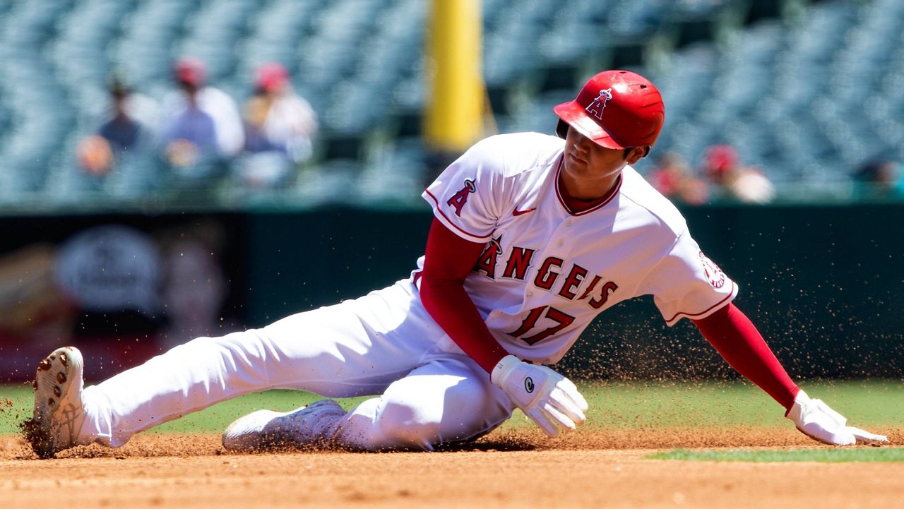 Langeliers' bases-loaded walk sends A's past Angels, 2-1
