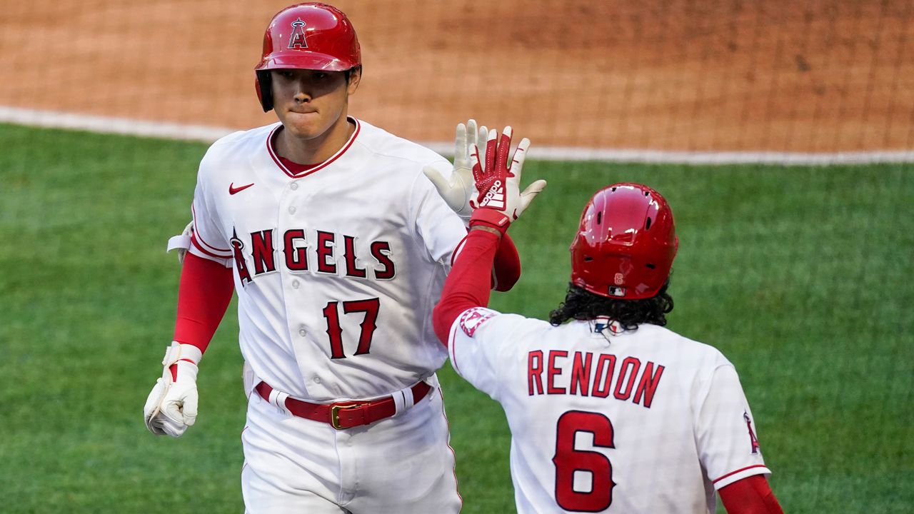 Ohtani gets win, ties for MLB home run lead as Angels beat Rangers - Los  Angeles Times