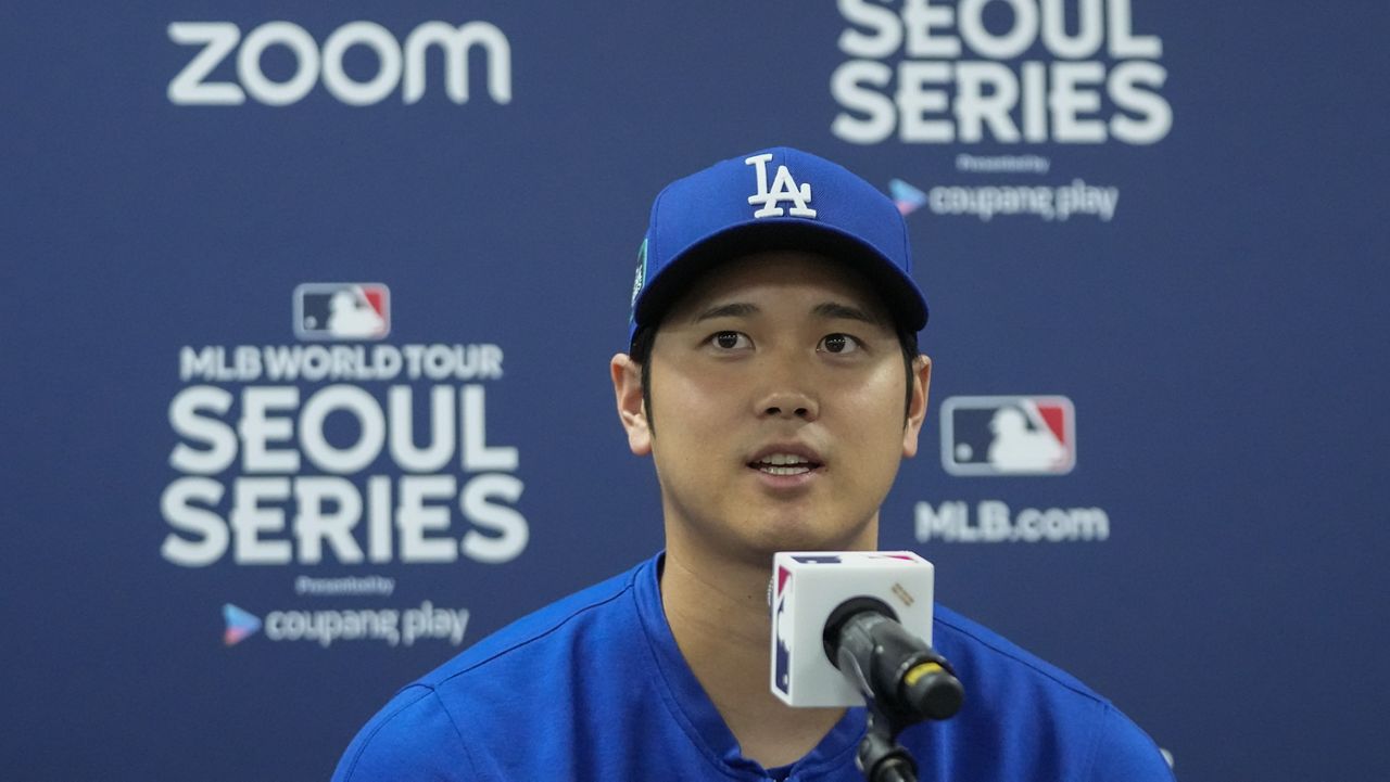 Los Angeles Dodgers' Shohei Ohtani attends a news conference ahead of a baseball workout at the Gocheok Sky Dome in Seoul, South Korea, Saturday, March 16, 2024. (AP Photo/Lee Jin-man)