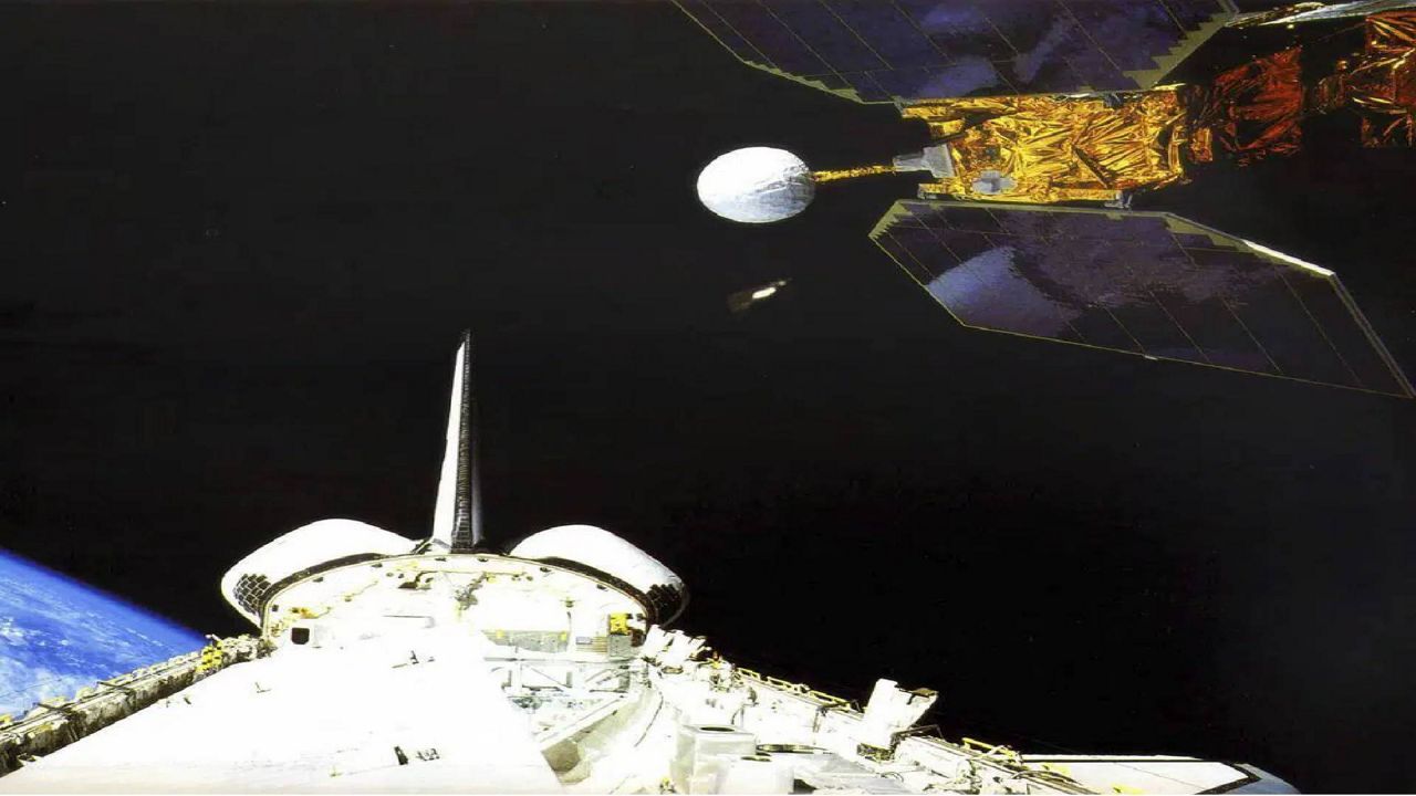 In this photo made available by NASA, the space shuttle Challenger launches the Earth Radiation Budget Satellite in 1984. On Friday, Jan. 6, 2023, the U.S. space agency said the 38-year-old NASA satellite is about to fall from the sky, but the chance of wreckage falling on anybody is “very low.” It's expected to come down Sunday night, give or take 17 hours. (NASA via AP)