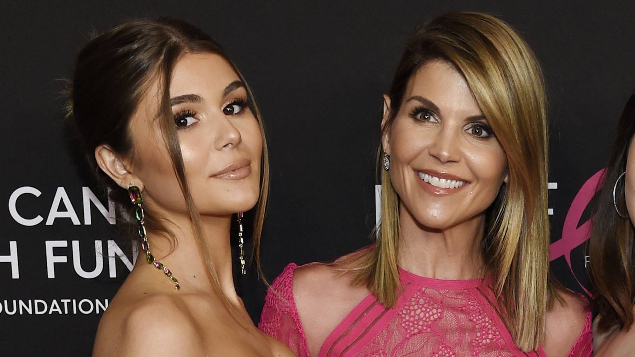 In this Feb. 28, 2019, file photo, actress Lori Loughlin poses with her daughter Olivia Jade Giannulli, left, at an event in Beverly Hills, Calif. (Photo by Chris Pizzello/Invision/AP, File)