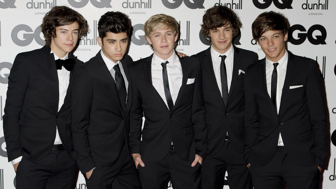 One Direction's Liam Payne, second from right, poses for a photo with fellow band members Harry Styles, Zayn Malik, Niall Horan and Louis Tomlinson at the GQ Men of the Year Awards in London, Sept. 6, 2011. (AP Photo/Jonathan Short, File)