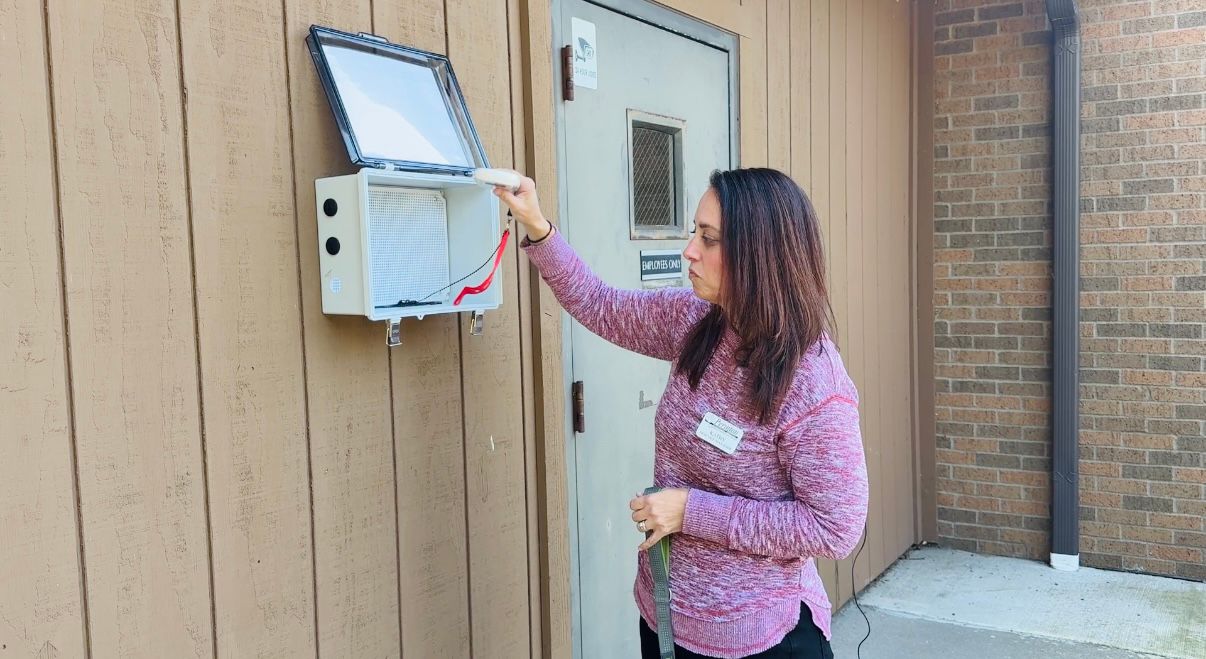 Community pet microchip scanning station