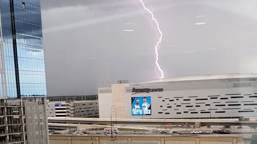 Sent to us with the Spectrum News 13 app: A lightning bolt  behind the Amway Center in Orlando Thursday. (Jonathan Owens, Viewer)