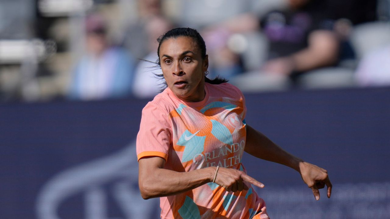 Orlando Pride's Marta (10) in action during an NWSL soccer match between the Orlando Pride and Racing Louisville, Saturday, March 16, 2024, in Louisville, Ky. (AP Photo/AJ Mast)