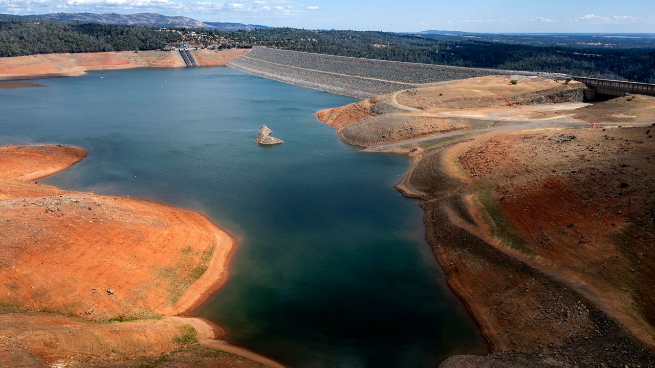 Dry hillsides surround Lake Oroville on Saturday, May 22, 2021, in Oroville, Calif. (AP Photo/Noah Berger)