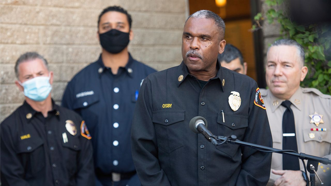 Los Angeles County Fire Department Chief Daryl L. Osby speaks during a press conference in front of Sheriff Department building in Lomita, Calif., Tuesday, Feb. 23, 2021, regarding golfer Tiger Woods' car accident. (AP Photo/Kyusung Gong)
