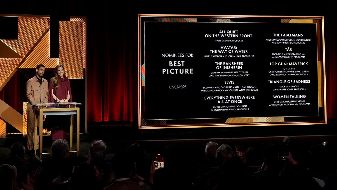 Riz Ahmed, left, and Allison Williams announce the Academy Awards nominations for best picture at the 95th Academy Awards nomination ceremony on Tuesday, Jan. 24, 2023, at the Academy Museum in Los Angeles. (AP Photo/Jae C. Hong)