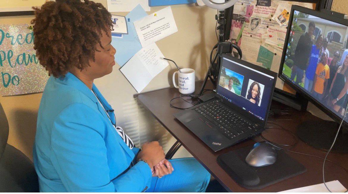 Karla Noland conducts a zoom call to help people who are grieving over the holidays