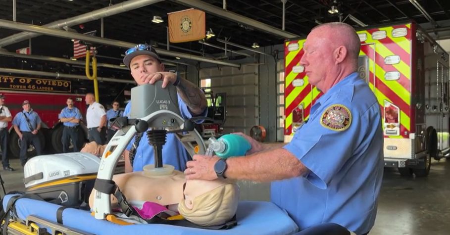 Oviedo firefighters demonstrate a chest compression device and an intubation kit the department recently purchased. (Spectrum News/Khyati Patel)