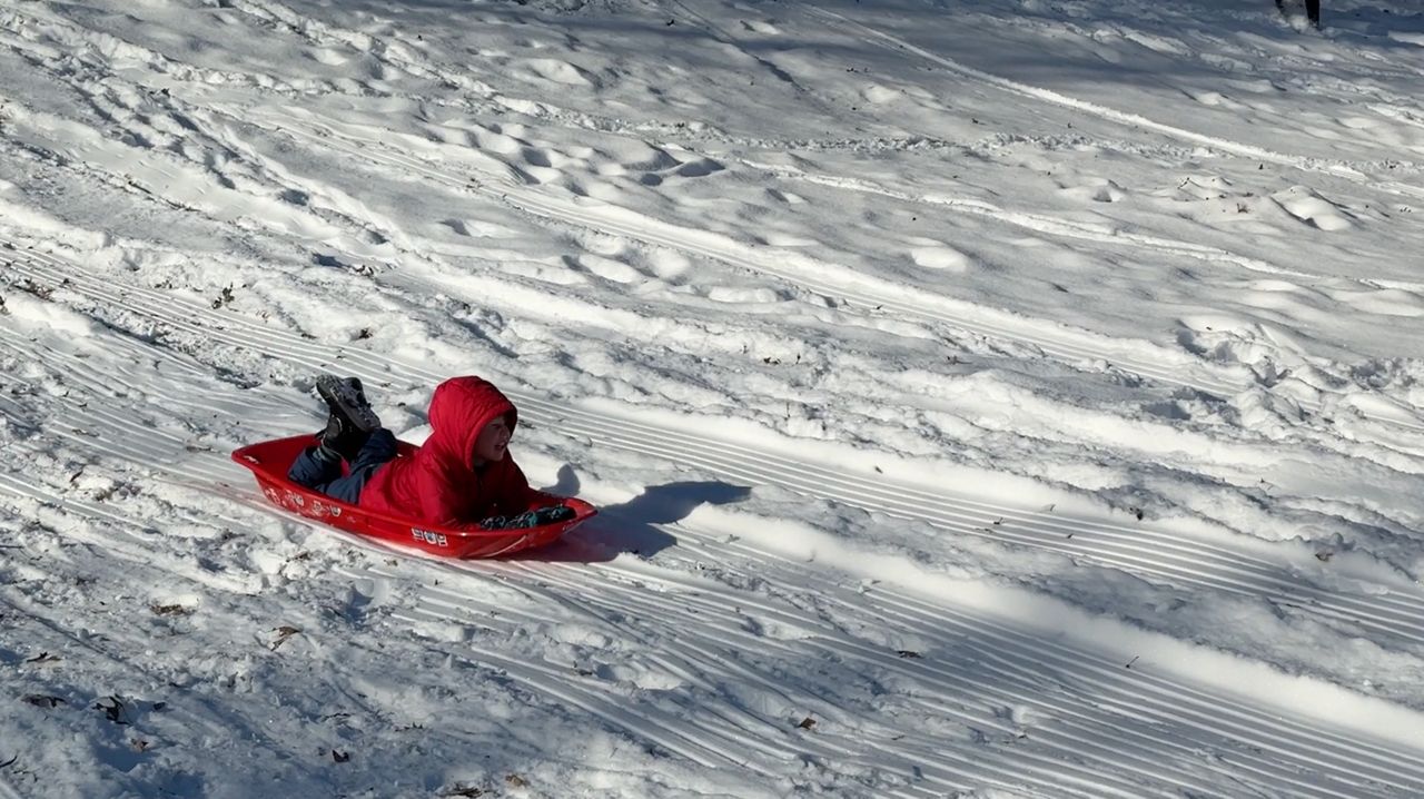North Carolinians get outside to enjoy record-breaking snowfall totals