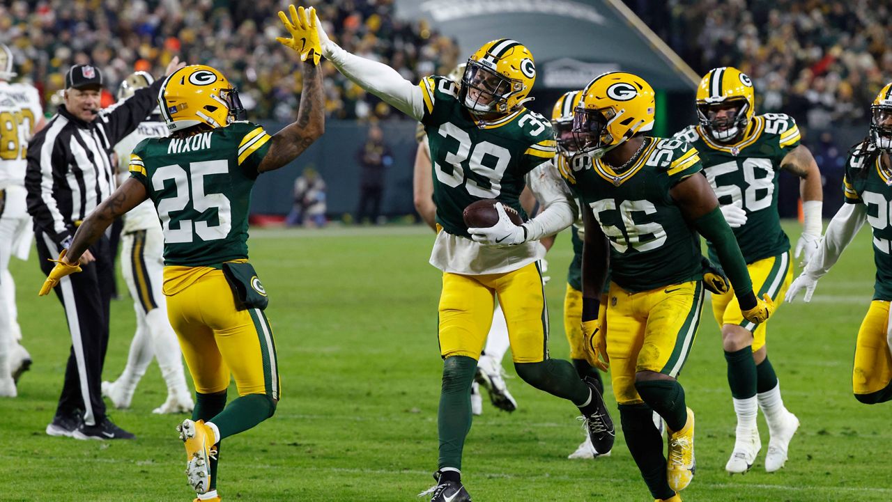 Green Bay Packers safety Zayne Anderson (39) celebrates his interception during the second half of an NFL football game against the New Orleans Saints