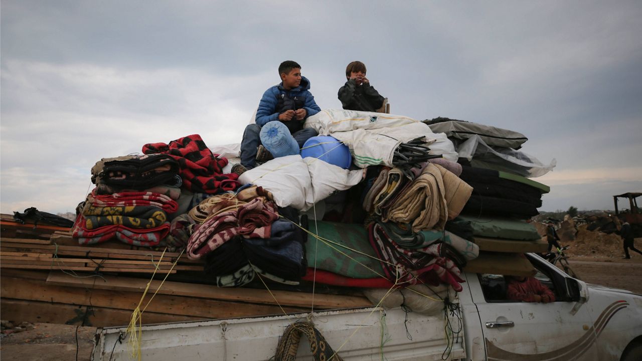 Displaced Palestinians make their way from central Gaza to their homes in the northern Gaza Strip, Monday, Feb. 10, 2025. (AP Photo/Jehad Alshrafi)