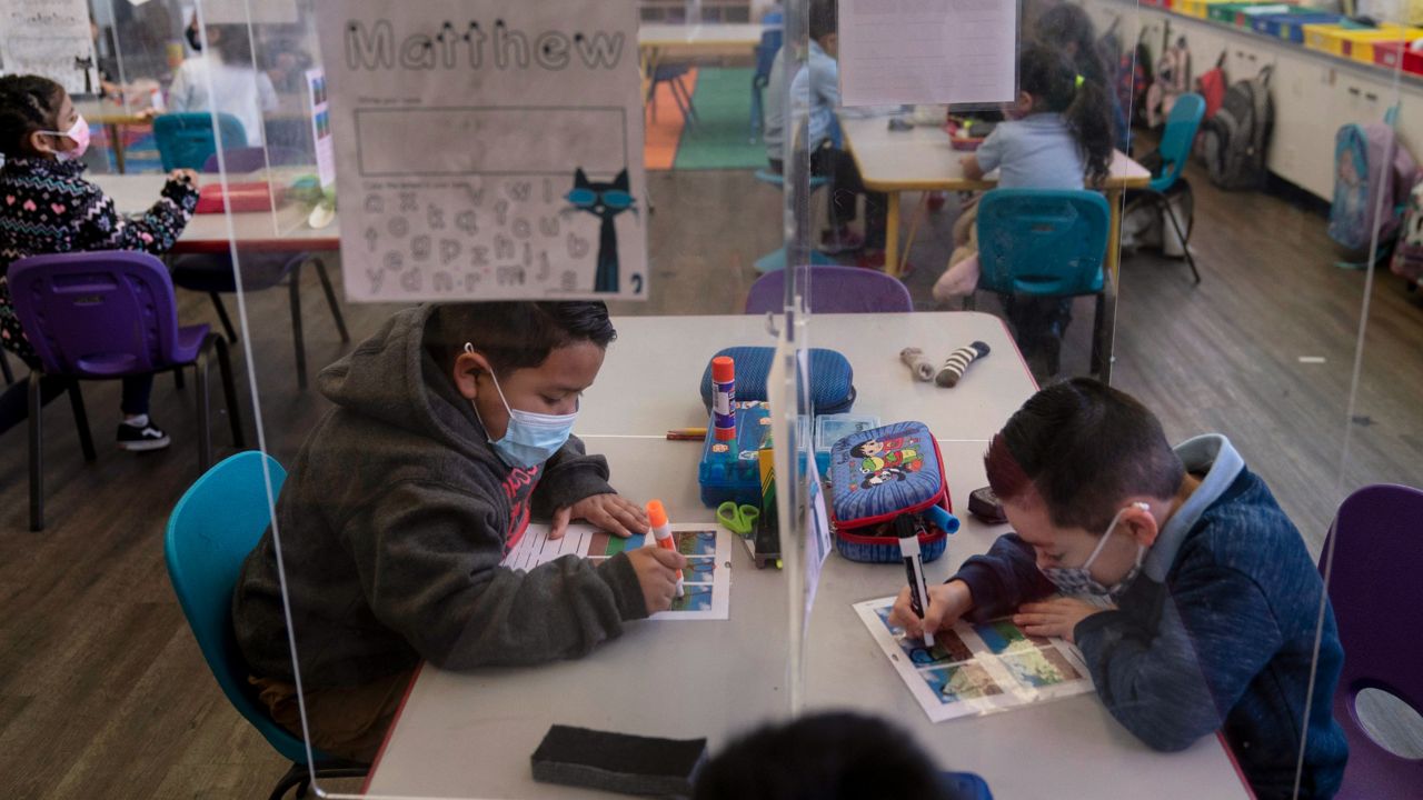 Pre-kindergarten students complete their school work at West Orange Elementary School in Orange, Calif., on March 18, 2021. (AP Photo/Jae C. Hong, File)