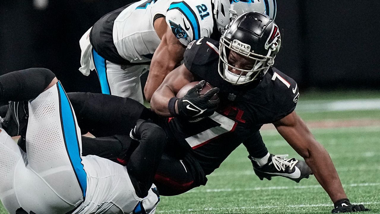 Bijan Robinson outshines top pick Bryce Young as Falcons knock off Panthers  24-10