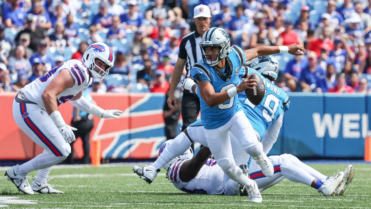 Carolina Panthers quarterback Bryce Young scrambles in the first half of an NFL preseason football game against the Buffalo Bills, Saturday, Aug. 24, 2024, in Orchard Park, N.Y. (AP Photo/Jeffrey T. Barnes)