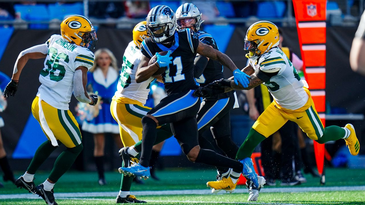 Carolina Panthers wide receiver Ihmir Smith-Marsette runs for a touchdown against the Green Bay Packers during the first half of an NFL football game Sunday, Dec. 24, 2023, in Charlotte, N.C. (AP Photo/Rusty Jones)